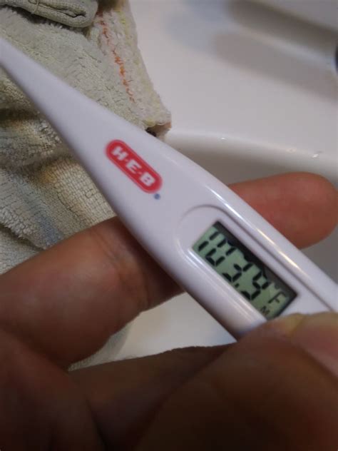 People with high-grade. . Real 102 fever thermometer pic